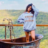 Janhvi Kapoor looks annoyed as she poses in a rusted bathtub