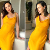 Gal Gadot flaunts her baby bump in stunning yellow satin dress