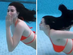 Giorgia Andriani shares a video of herself swimming underwater in a red bikini