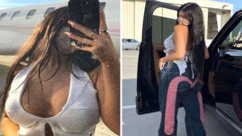 Kylie Jenner pairs plunging neckline crop top with printed wide leg pants