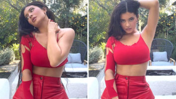 Kylie Jenner sets the temperature soaring in fierce one sleeve red crop top and leather pants