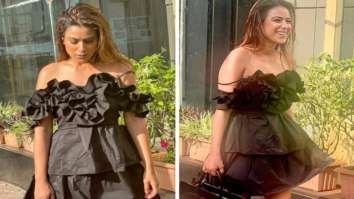 Nia Sharma sizzles in off-shoulder mini ruffle dress and pairs it with black pumps and handbag