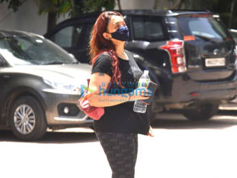 Photos: Remo D'Souza snapped with his wife Lizelle D'Souza at his office in Andheri