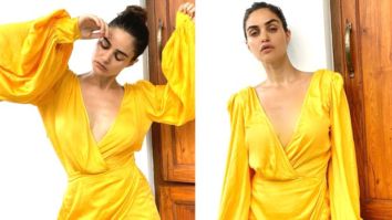 Gabriella Demetriades is a ray of sunshine in plunging neckline yellow mini wrap dress