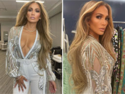 Jennifer Lopez is a vision in plunging neckline top and white pants at Vax Live concert by Global Citizen