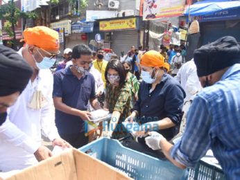 Photos: Mika Singh, Vindu Dara Singh and Bhoomi Trivedi snapped distributing food to needy people at Goregaon