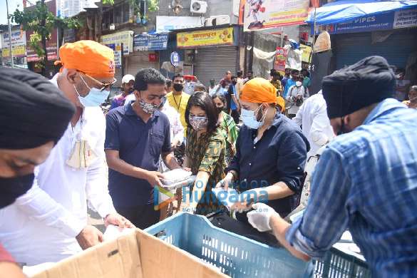 photos mika singh vindu dara singh and bhoomi trivedi snapped distributing food to needy people at goregaon 2