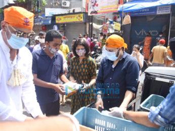 Photos: Mika Singh, Vindu Dara Singh and Bhoomi Trivedi snapped distributing food to needy people at Goregaon