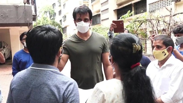 Sonu Sood meets with some needy people outside his building
