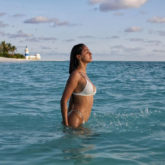 Disha Patani sets the temperature soaring skimpy white bikini in this beach photo