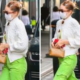 Gigi Hadid steps out in style for vaccine appointment in white top and bright neon pants