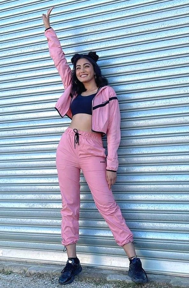 Khatron Ke Khiladi 11 Sana Makbul keeps it casual in pink athleisure and cat bun hairdo