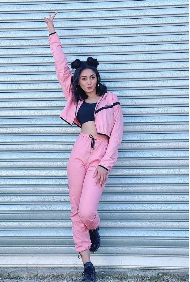 Khatron Ke Khiladi 11 Sana Makbul keeps it casual in pink athleisure and cat bun hairdo
