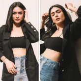 Mrunal Thakur pairs a black bralette with a blazer and flared jeans for Toofan promotions