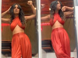 Nia Sharma dons risky criss-cross tie-up top and high waist pants in these sultry pictures