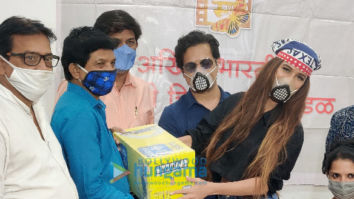 Photos: Poonam Pandey snapped distributing rations and essentials to spot boys