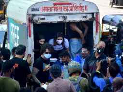 Sunny Leone and Daniel Weber snapped distributing food at Earth cafe in Bandra