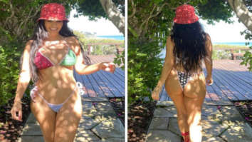 Kourtney Kardashian is all about colour blocking in sexy skimpy bikini and bucket hat on 4th of July weekend