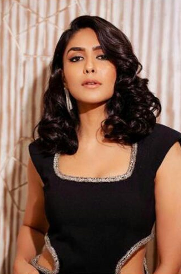Mrunal Thakur dons a Prabal Gurung black midi dress with waist cut outs for Toofan prompotions Mrunal Thakur dons a Prabal Gurung black midi dress with waist cut outs for Toofan prompotions