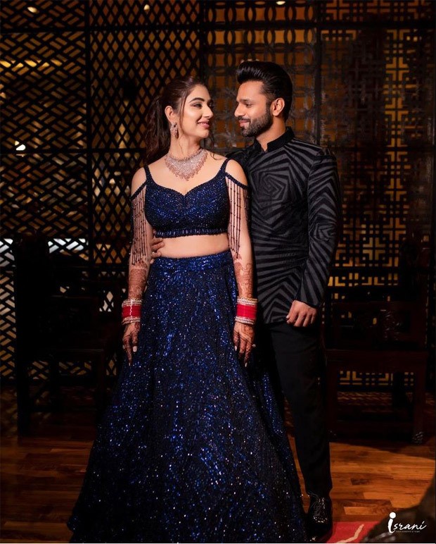Rahul Vaidya keeps it dapper in Abu Jani & Sandeep Khosla; Disha Parmar dons blue embellished lehenga for after party