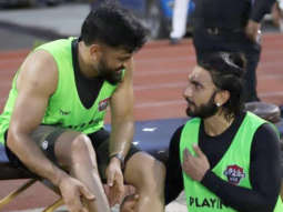 Ranveer Singh and M.S Dhoni share a victory hug during their football match