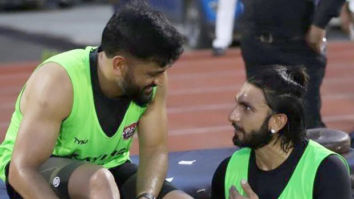 Ranveer Singh and M.S Dhoni share a victory hug during their football match