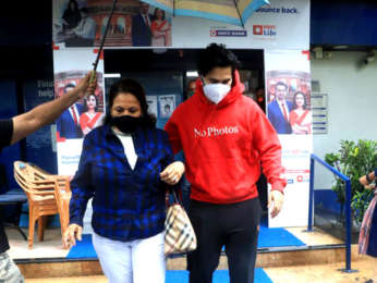 Photos: Varun Dhawan snapped with his mother at a bank in Santacruz Photos: Varun Dhawan snapped with his mother at a bank in Santacruz