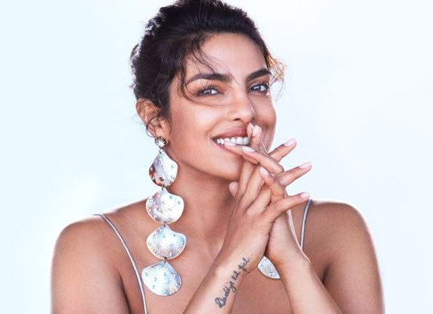Priyanka Chopra Jonas celebrates father Ashok Chopra's 71st birthday by cutting a cake with "Happy birthday Papa" written on it