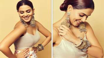 Genelia Deshmukh makes a statement in a specially printed skirt and cowl neck satin top