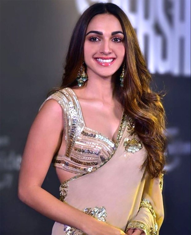 Kiara Advani makes heads turn in a beige gold saree by Manish Malhotra while promoting Shershaah Kiara Advani makes heads turn in a beige gold saree by Manish Malhotra while promoting Shershaah