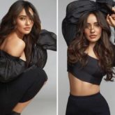 Neha Sharma elevates basic look with puffed sleeved off-shoulder crop top and black figure-hugging skirt
