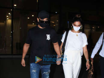 Photos: Ranveer Singh and Deepika Padukone snapped at the airport Photos: Ranveer Singh and Deepika Padukone snapped at the airport