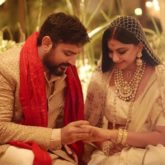 Rhea Kapoor shares her first wedding picture with her husband Karan Boolani donning ivory Anamika Khanna lehenga