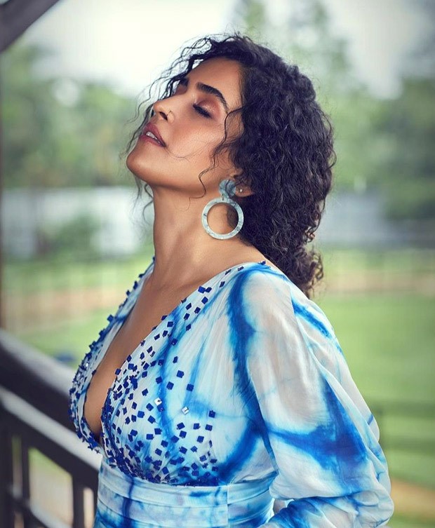Sanya Malhotra looks beautiful in a blue and white dress for a cover shoot