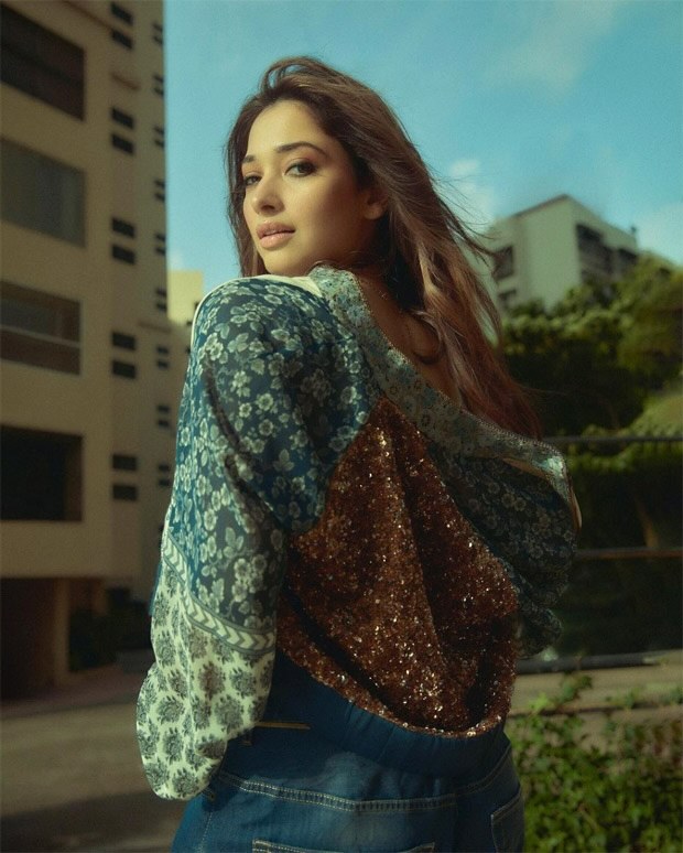 Tamannaah Bhatia exudes 70's vibes in lace bralette, embroidered bomber jacket and baggy denims from Sabyasachi x H&M collection worth Rs. 18,195