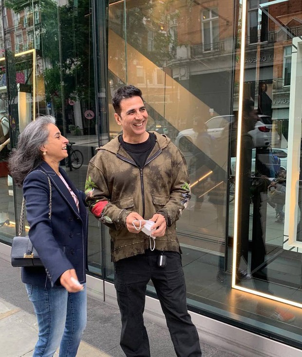 Akshay Kumar strikes a pose with a fan on the streets of London