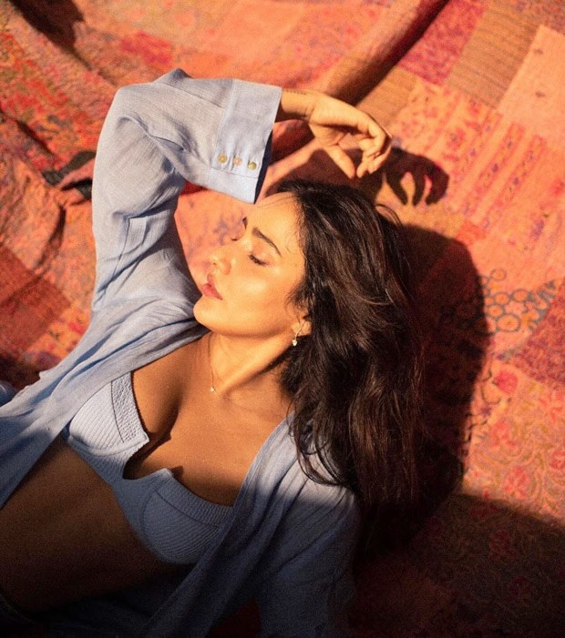Neha Sharma shares swoon-worthy pictures in sky blue bikini top and a matching open button dress worth Rs. 17,000