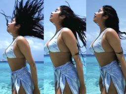 Janhvi Kapoor shares the most filmy beach video in a sexy sequined bikini top with a matching sarong