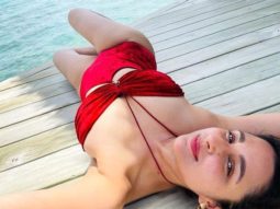 Parineeti Chopra raises temperature in a red bikini; Priyanka Chopra asks “Inspired?”