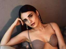 Radhika Mandan goes bold in a sexy nude brown bralette and draped skirt