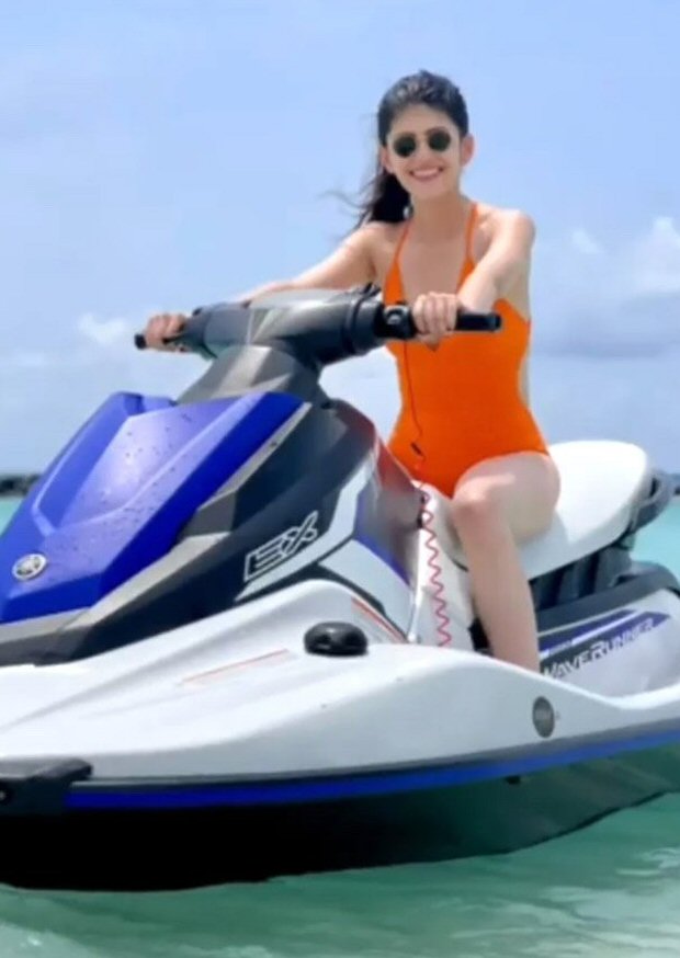 Sanjana Sanghi makes a splash in orange swimsuit while holidaying in Maldives Sanjana Sanghi makes a splash in orange swimsuit while holidaying in Maldives