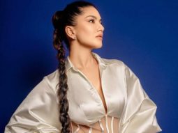 Sunny Leone flaunts her amazingly toned figure in a sexy off-white satin semi-sheer dress