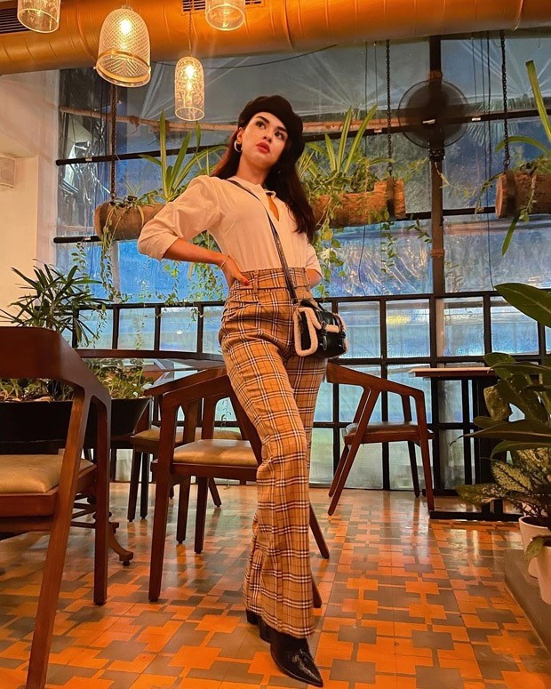 Avneet Kaur pairs a shirt with checkered pants and a beret