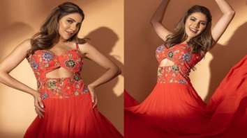 Nikki Tamboli looks breathtaking in a gorgeous red gown