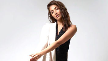 Pooja Hegde flaunts her toned body in a black monokini