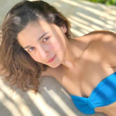 Alia Bhatt gives a killer look as she poses in a blue bikini