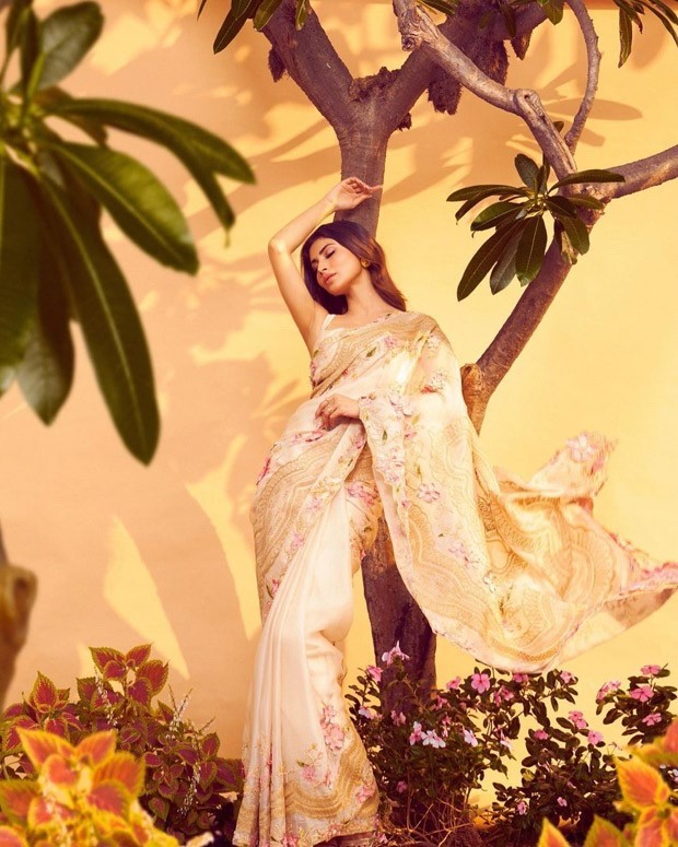 Mouni Roy enjoys in the festive season in a gorgeous beige floral saree