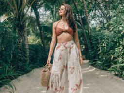 Pooja Hegde stirs a tropical storm in a brown bralette and a wide leg tie dye pants