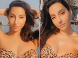 Nora Fatehi looks stunning in a leopard print bikini while relaxing in the pool in Dubai