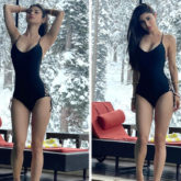 Mouni Roy raises temperatures in a black monokini with snow-capped hills in the backdrop